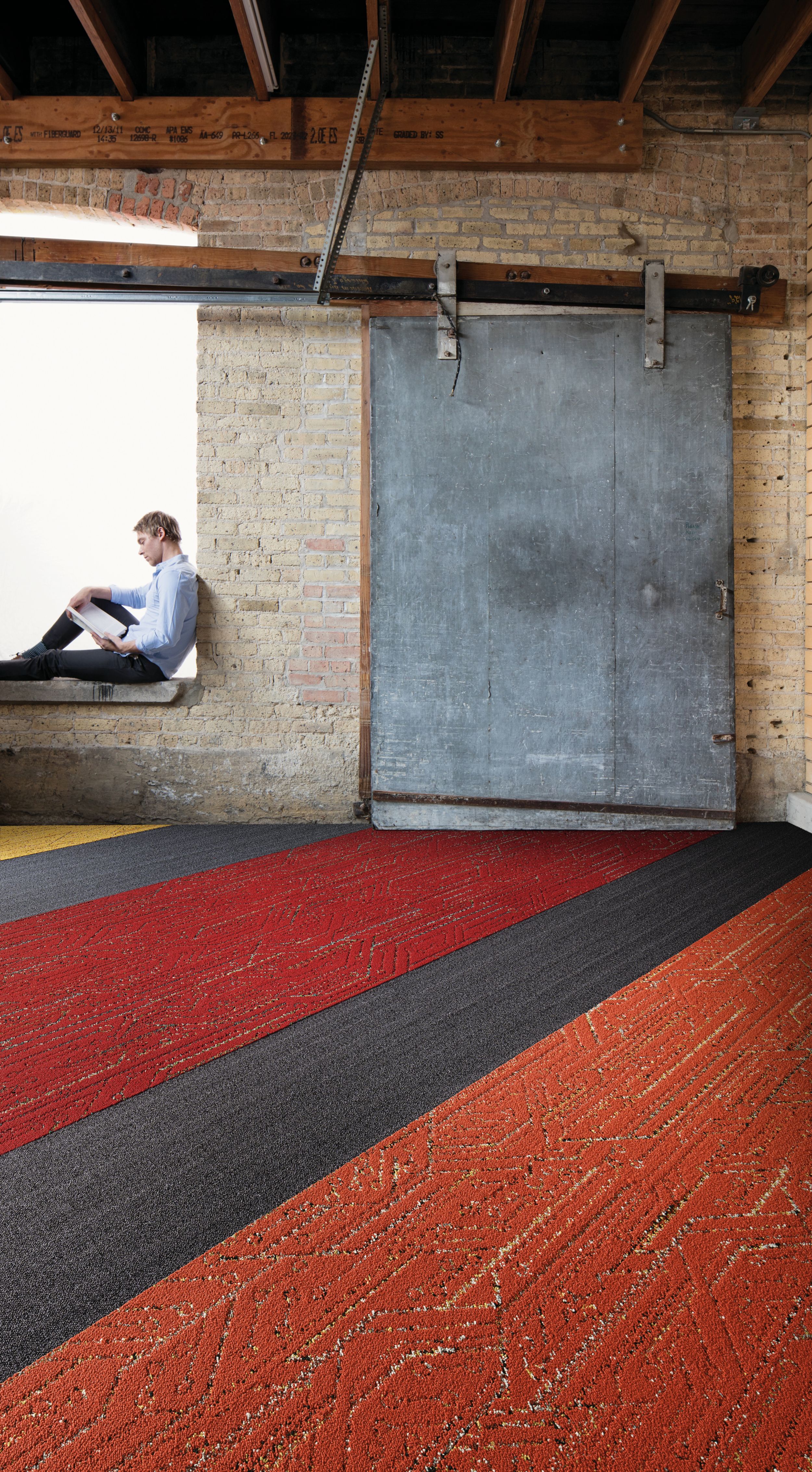 Interface Circuit Board and Plain Stitch plank carpet tile in modern office building with man seated image number 10